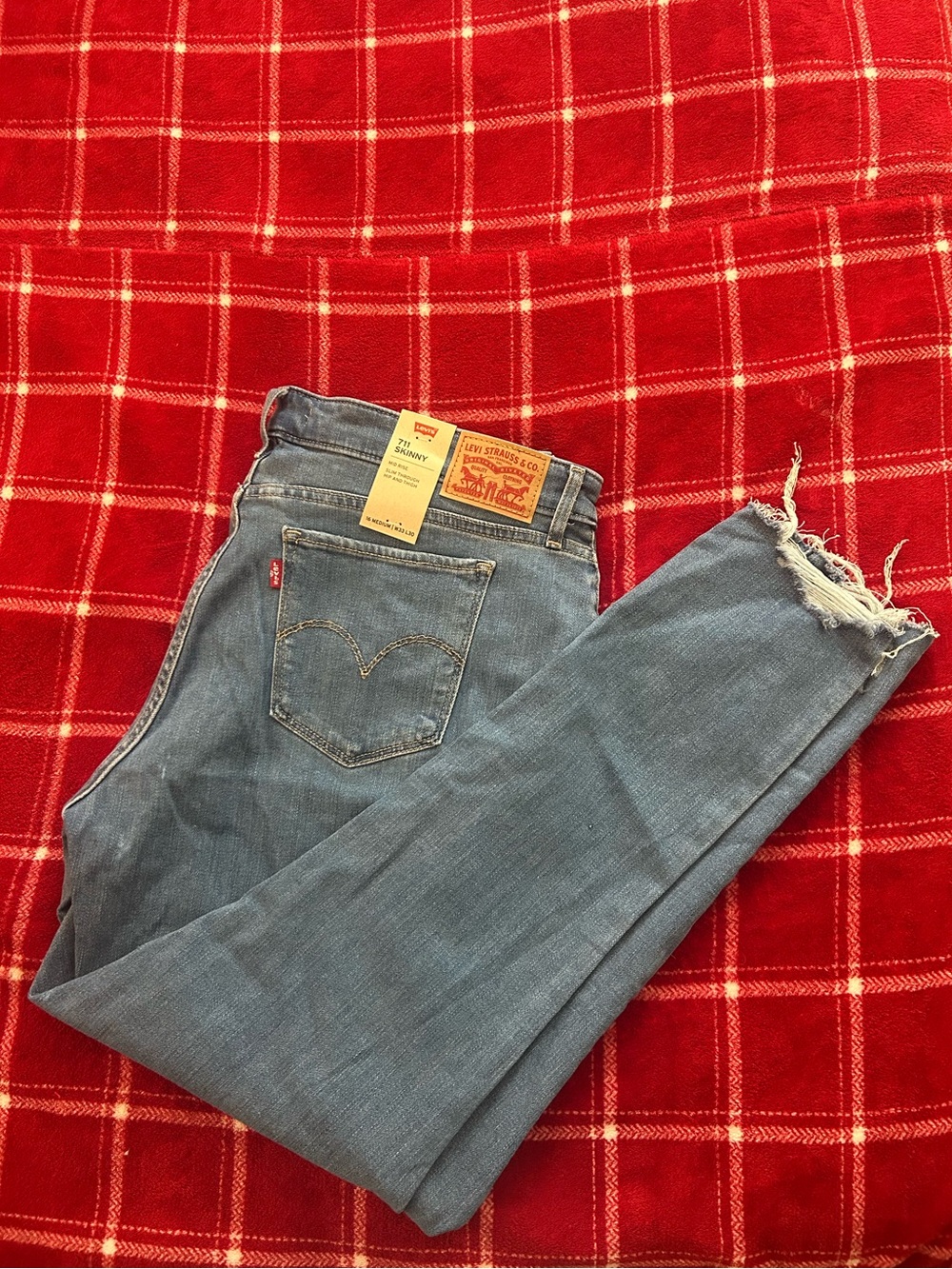 Levi's Women's Light Blue Skinny Jeans with Distressed Hem